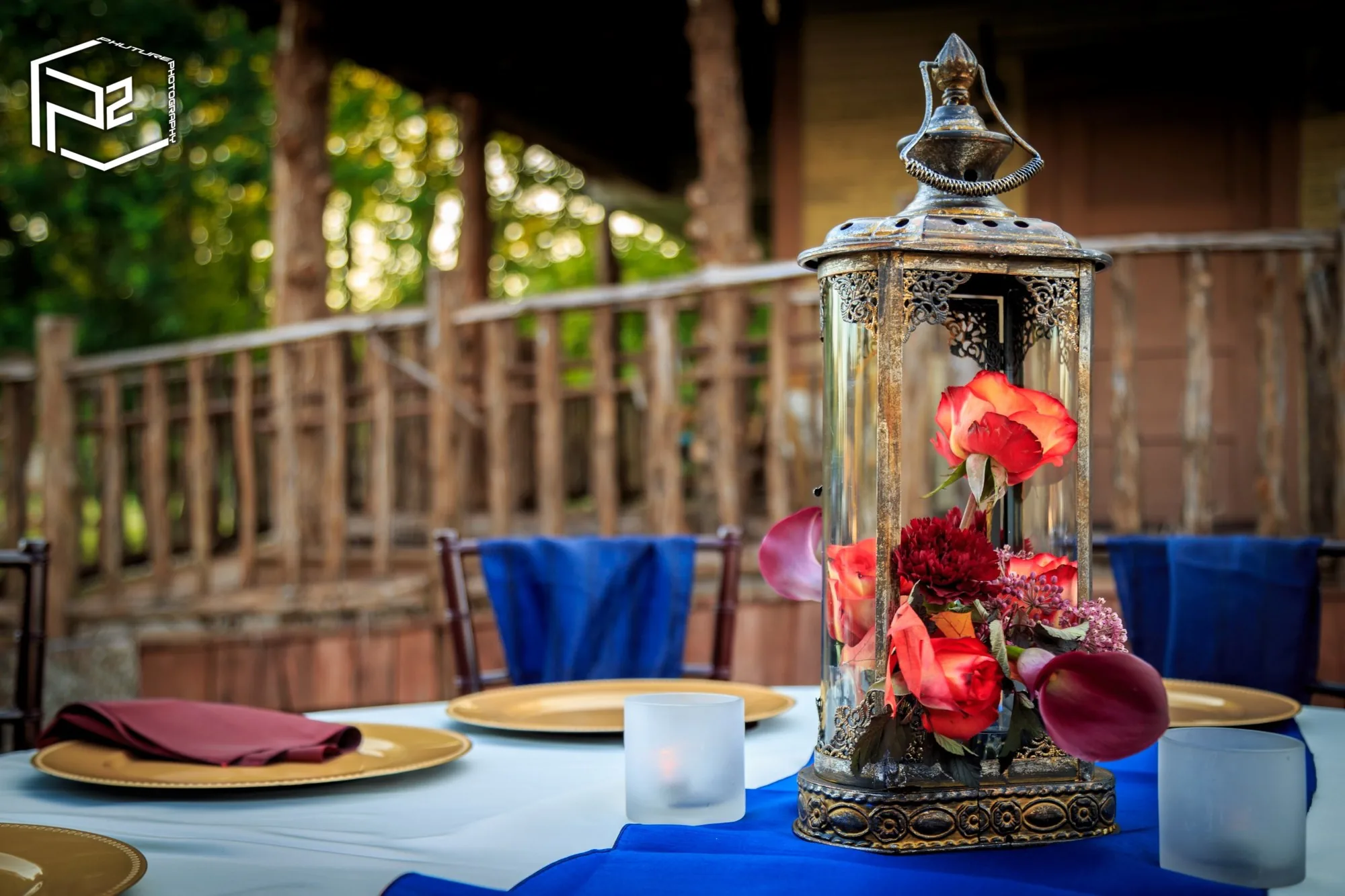 Lantern centerpiece on blue linen