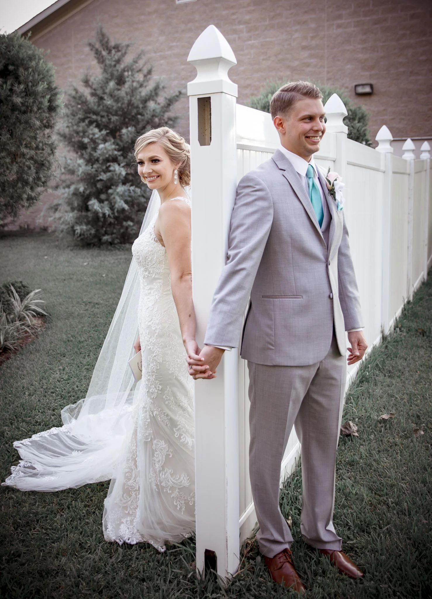 Aubrey and Chase embrace on the staircase