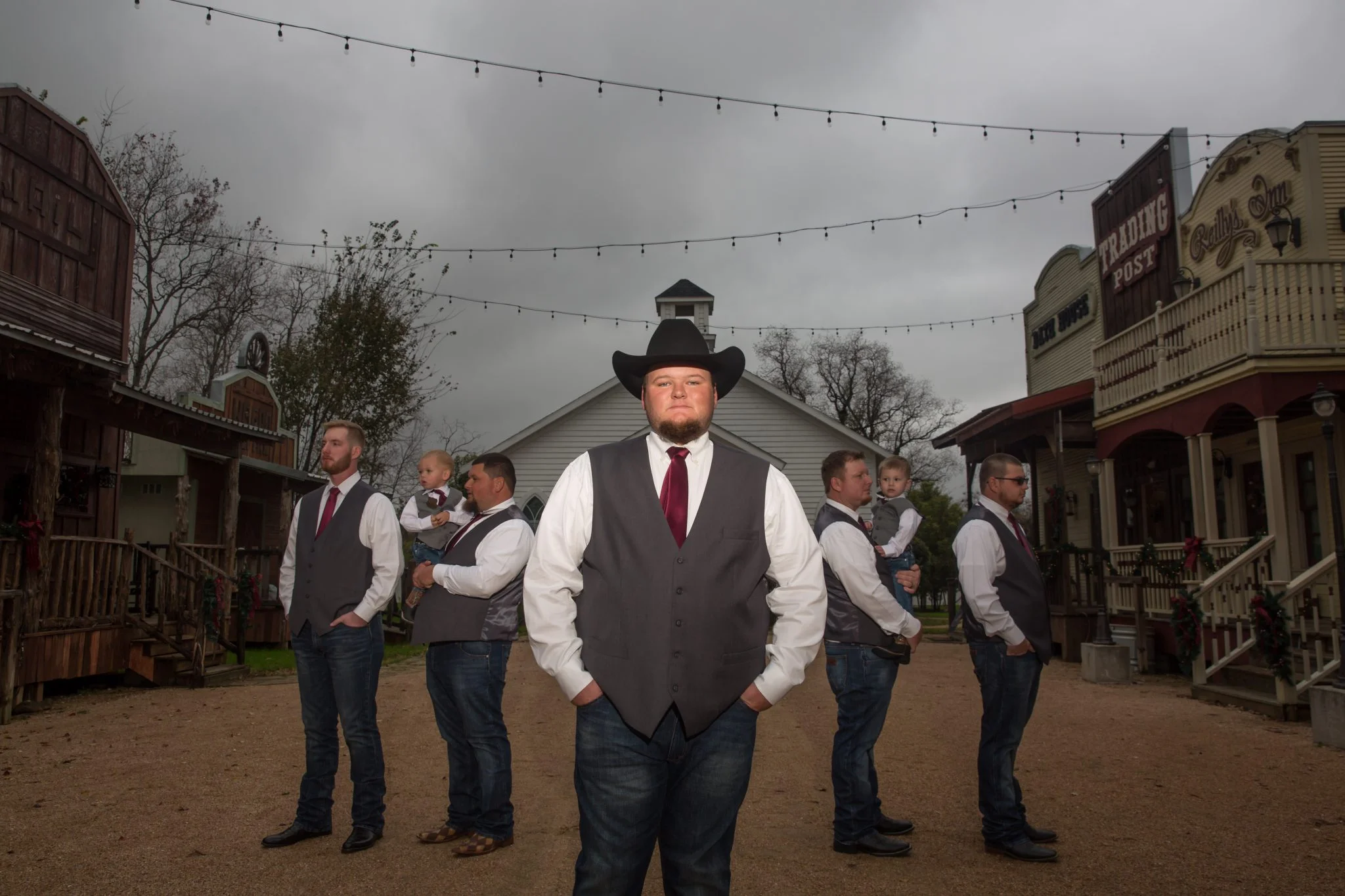 Ethan and the groomsmen in cowboy hats in Sycamoreville