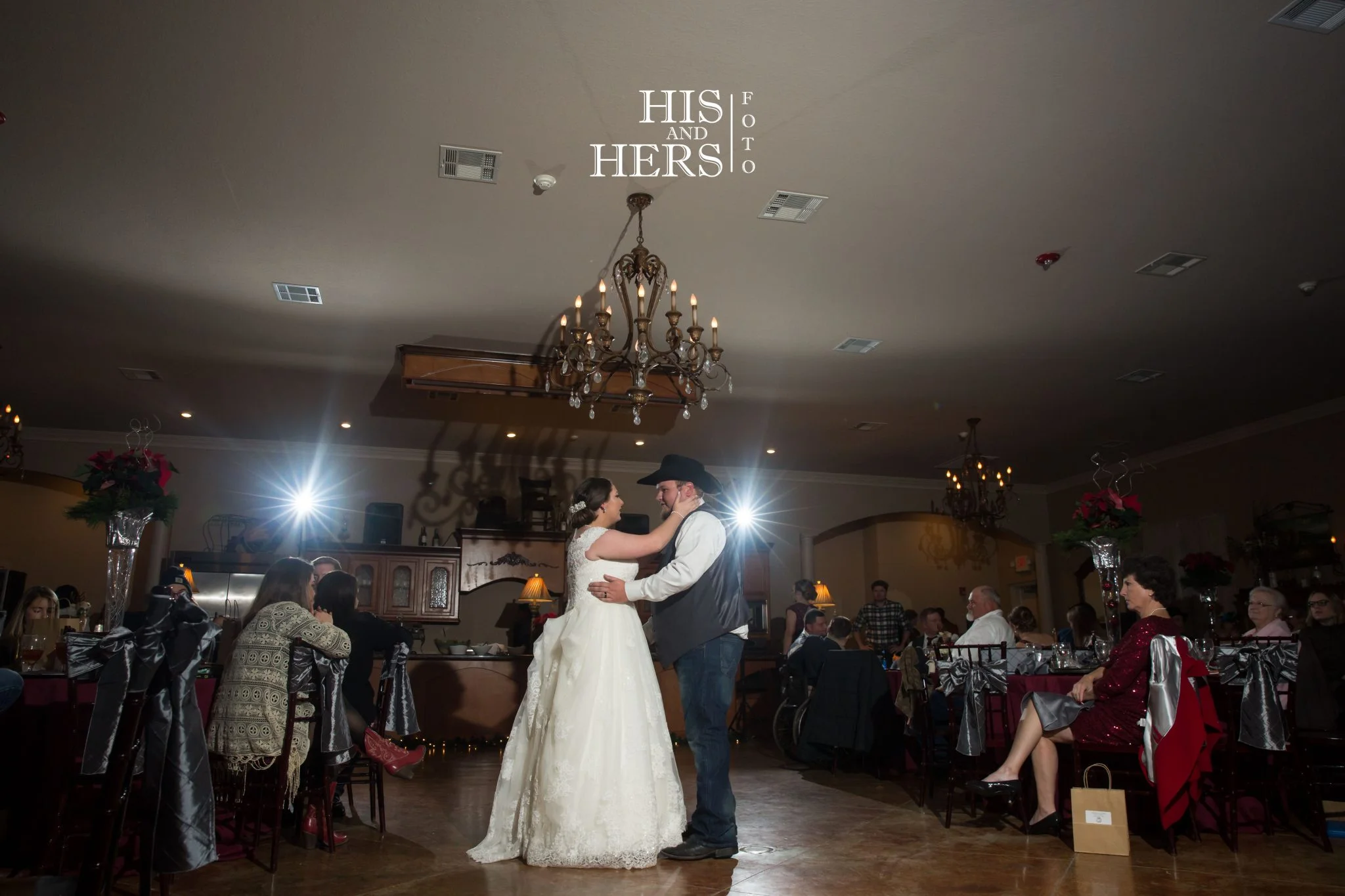 Kristen and Ethan's first dance under the chandelier